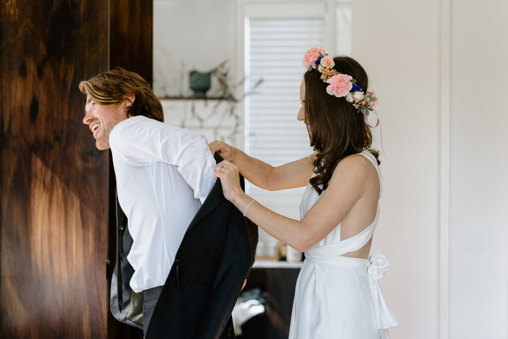 couple getting ready together on their elopement day